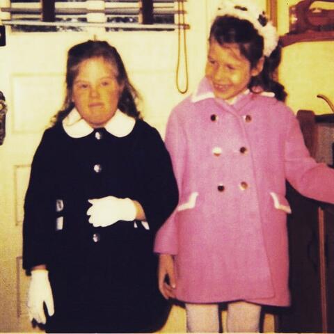 A photo of two young girls in coats (Chris and Dianne Bilyak, 1971)