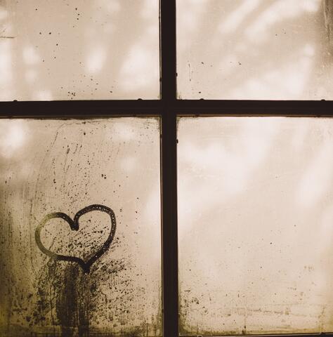 heart on window pane