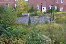 outdoor labyrinth surrounded by greenery